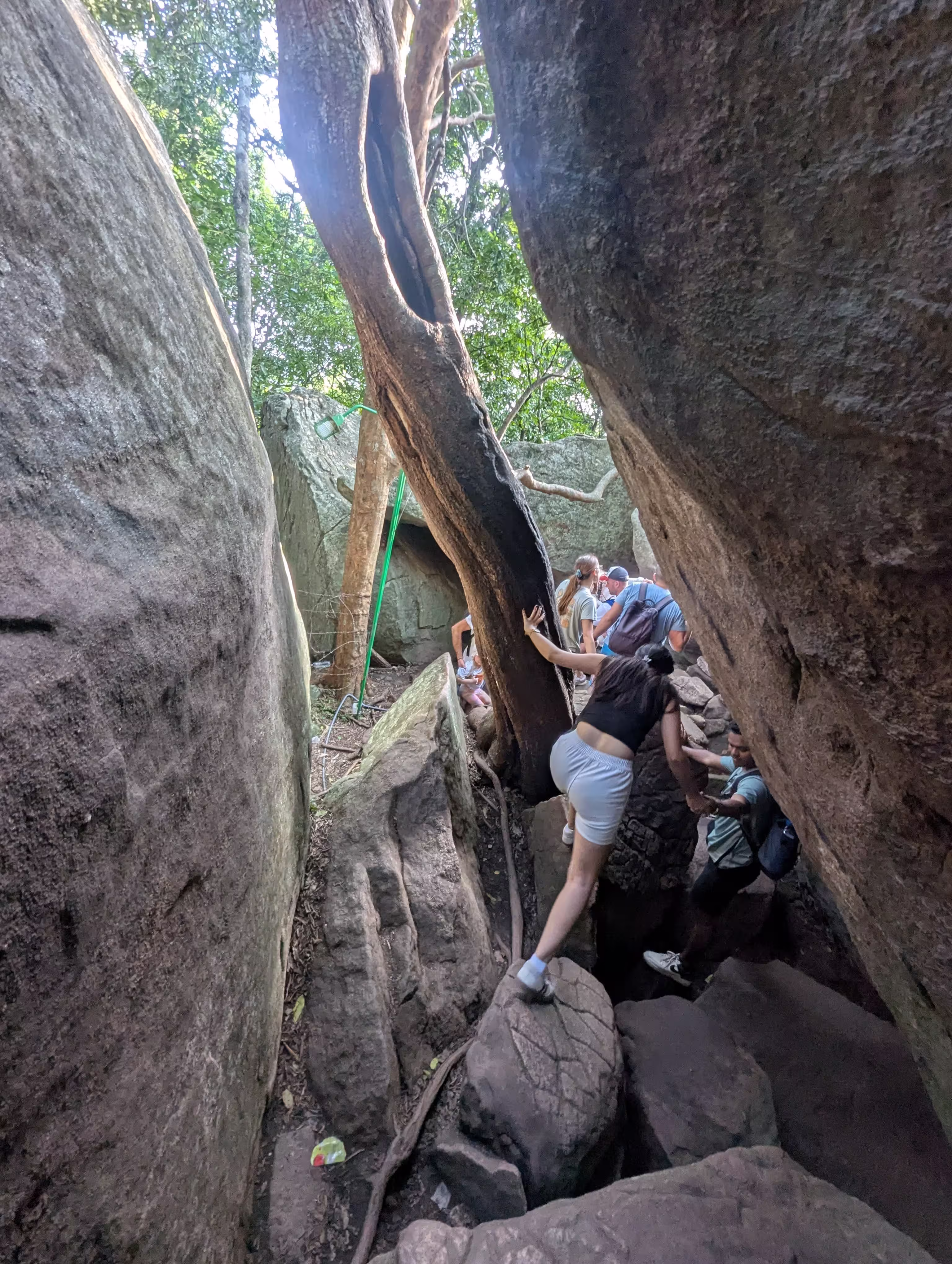 Hiking up the boulders at Pidurangala